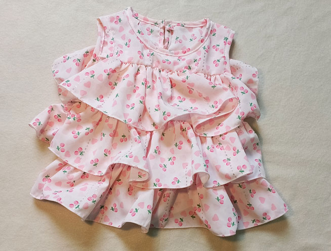 Sonamani's cute cherry printed three-layer pink frock